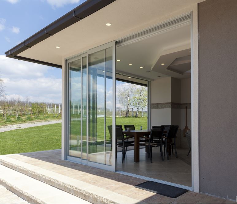 Silver framed aluminium sliding doors.