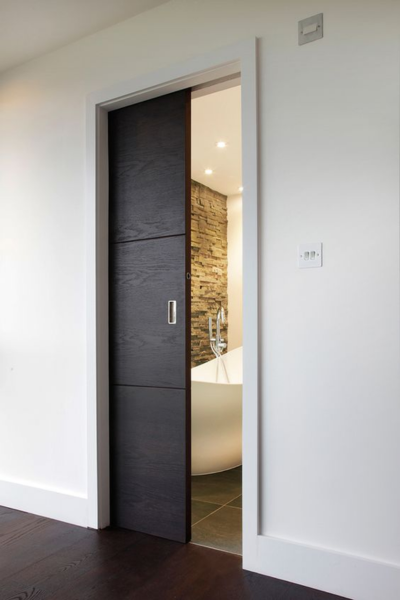 Black cavity bathroom door.