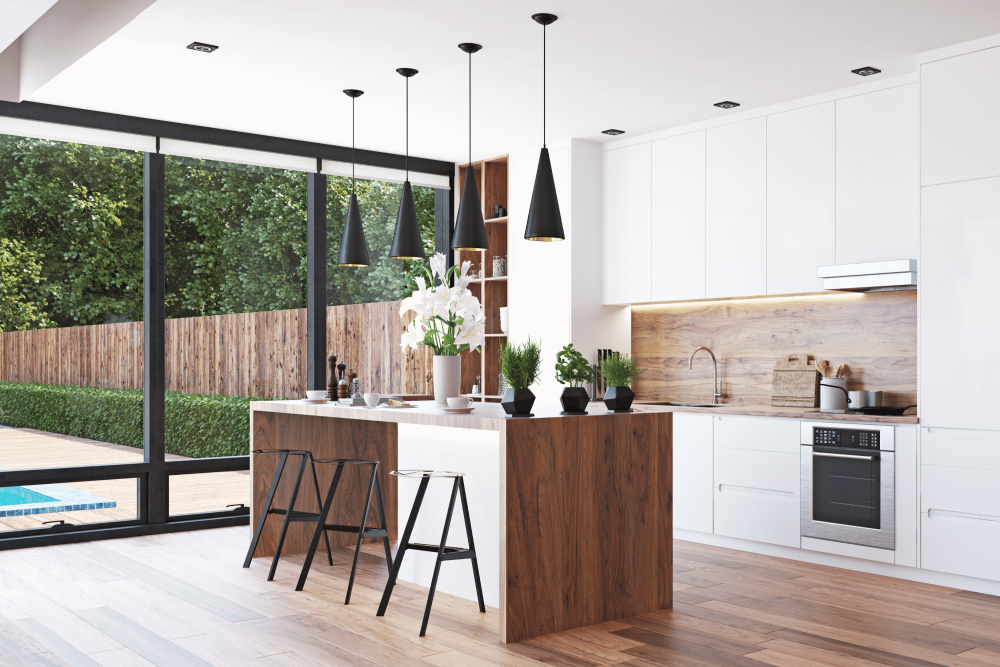 Beautiful, modern kitchen with black alumiunium window frames.