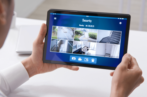 Home security system displayed on a tablet.